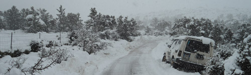 Neve lungo una strada ad Alà dei sardi